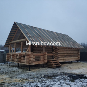 Баня с верандой из сруба в чашу